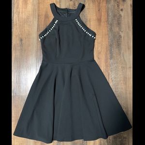 Short black dress with pearls